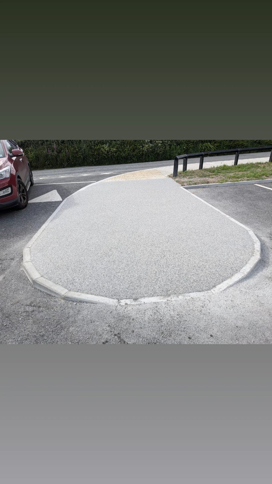 Resin Bound Pedestrian Island — A raised pedestrian refuge finished in permeable resin bound surfacing.