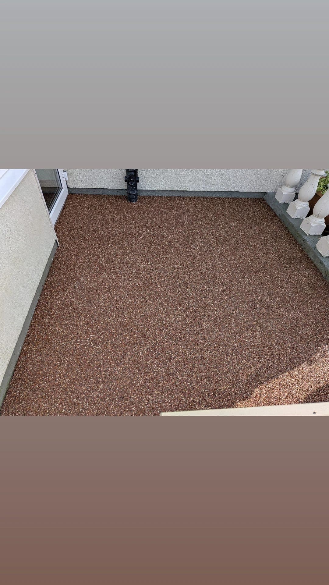 Resin Bound Patio, Terracotta Finish — A warm terracotta-toned patio finish.